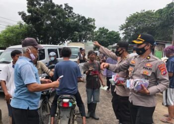 Satgas Aman Nusa 2021 Bagikan 15.000 Masker di Pasar Kalodran