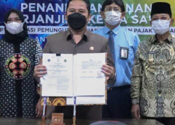 3 PEMERINTAH DAERAH TANDATANGANI PKS DENGAN DJP DAN DJPK