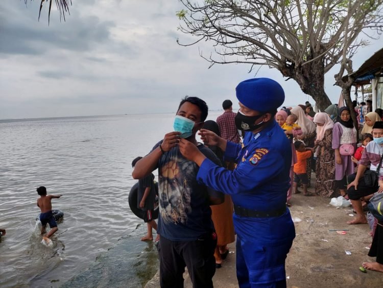 Satpolairud Polresta Tangerang Imbau Tingkatkan Prokes Bagi Masyarakat di Desa Kronjo