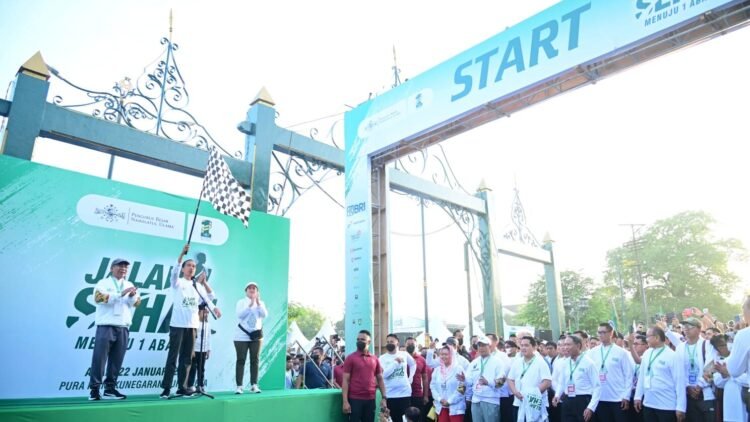 Presiden Jokowi Buka dan Ikuti Jalan Sehat Menuju 1 Abad Nahdlatul Ulama